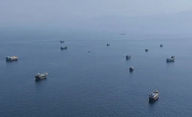 A drone view shows vessels near the Strait of Hormuz, as seen from Musandam, Oman, August 28, 2026. REUTERS/Stringer