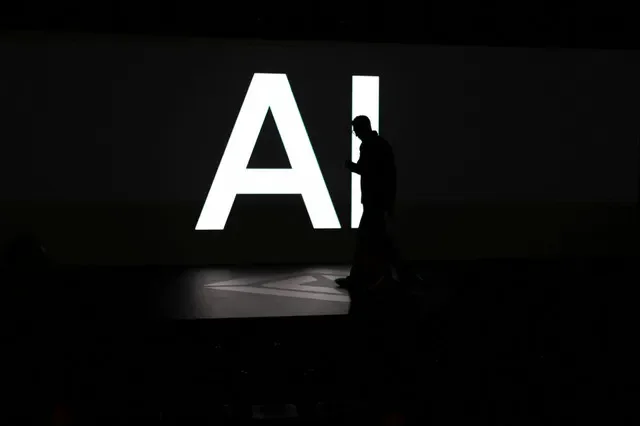 A screen reads 'AI' in reference to artificial intelligence in Palo Alto, California, U.S., December 11, 2025. REUTERS/Carlos Barria/File Photo