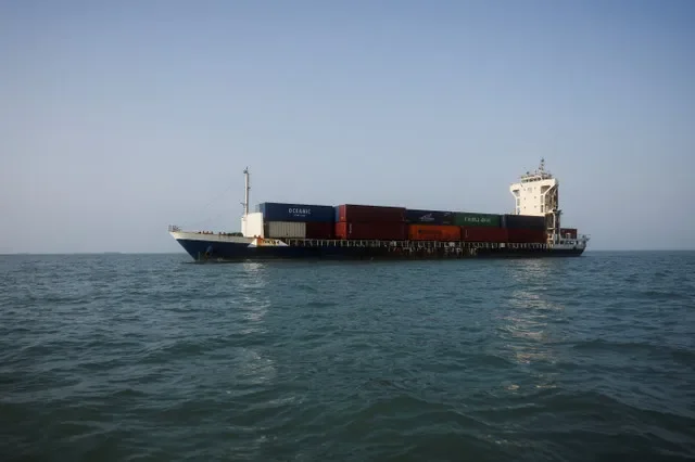 A vessel in the Strait of Hormuz visible near the beach of Bandar Abbas, Iran, August 27, 2026. Majid Asgaripour/WANA (West Asia News Agency) via REUTERS