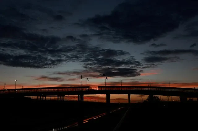 FILE PHOTO: The Lerdo-Stanton International Bridge at dawn on the day U.S. and Mexican trade negotiators meet for a third round of bilateral talks aimed at advancing the review of the North American trade agreement, as seen from Ciudad Juarez, Mexico, July 21, 2026. REUTERS/Jose Luis Gonzalez/File Photo