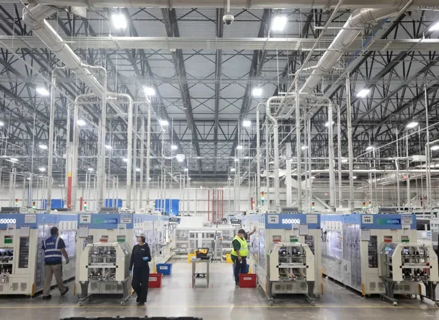 Qcells employees work inside the North America factory in Cartersville, Georgia, U.S. June 8, 2026. REUTERS/Alyssa Pointer