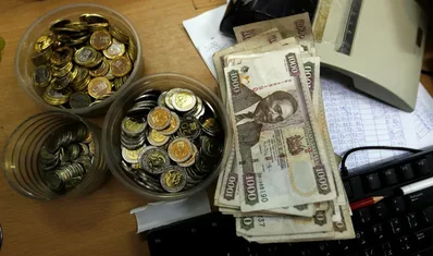 Ugandan and Ghanaian Currencies Face Losses