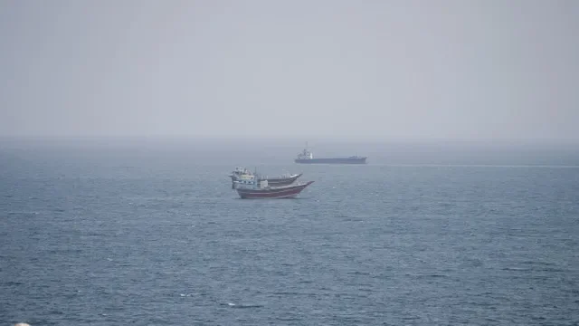 FILE PHOTO: Vessels near the Strait of Hormuz, as seen from Musandam, Oman, September 2, 2026. REUTERS/Stringer/File photo