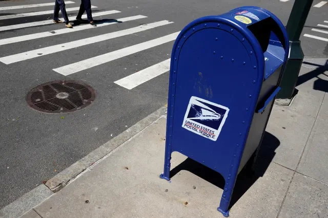 FILE PHOTO: A United States Postal Service (USPS) mailbox is seen in Manhattan, New York City, U.S., May 9, 2022. REUTERS/Andrew Kelly/File Photo