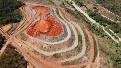 A Brazilian judge suspended environmental licenses for Sigma Lithium's Grota do Cirilo mine. The ruling follows a lawsuit by a traditional Quilombola community citing proximity risks. An independent expert review was ordered to determine the exact distance.