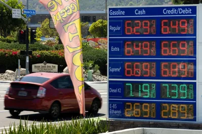 Americans face record-high gasoline prices over the Labor Day weekend due to ongoing Middle East conflicts impacting global energy costs. The national average is expected to reach $4.03 per gallon, putting a heavy strain on consumer travel and household budgets.