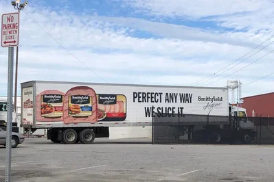 Smithfield Foods forecasts a third-quarter operating loss in its fresh pork business due to falling hog prices and squeezed margins. The processor expects total operating income to decline from last year.