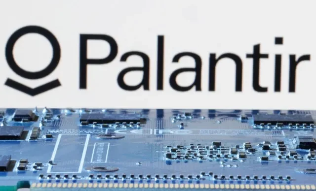 Palantir logo is seen near computer motherboard in this illustration taken January 8, 2024. REUTERS/Dado Ruvic/Illustration