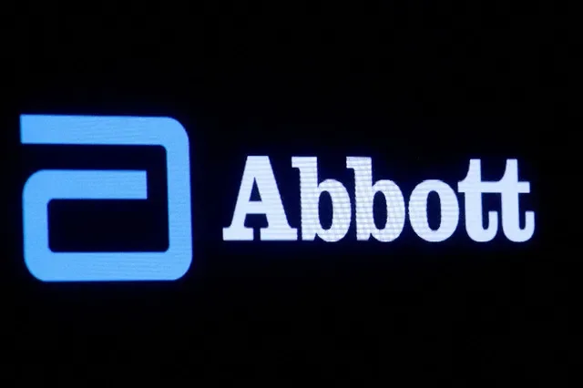 FILE PHOTO: Abbott Laboratories logo is displayed on a screen at the New York Stock Exchange (NYSE) in New York City, U.S., October 18, 2021. REUTERS/Brendan McDermid//File Photo