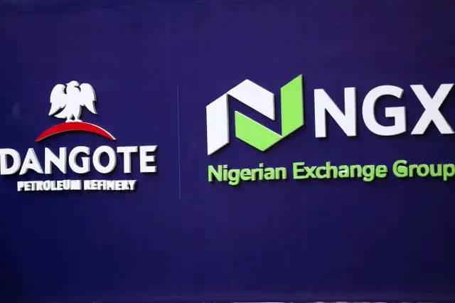 Logos of the Dangote Petroleum Refinery and the Nigerian Exchange Group (NGX Group) are displayed together at the opening day of Dangote Refinery's initial public offering (IPO) at the Nigerian Exchange Group (NGX Group) in Marina, Lagos, Nigeria, September 14, 2026. REUTERS/Sodiq Adelakun