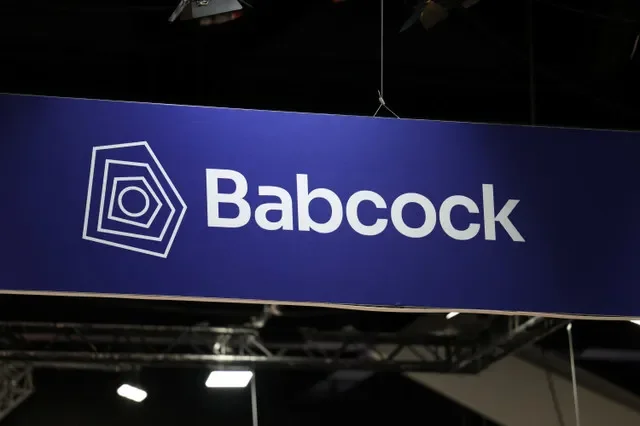 A Babcock logo is displayed above a stand on the first day of the Indo Pacific International Maritime Exposition in Sydney, Australia, November 4, 2025. REUTERS/Hollie Adams