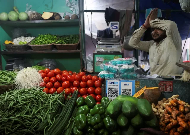 FILE PHOTO: A Paytm payment QR code displayed at a vegetable shop in Mumbai, India, October 31, 2025. REUTERS/Francis Mascarenhas/File Photo