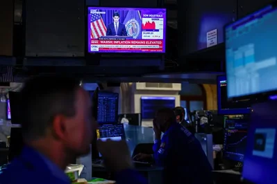 Stocks edge higher after Federal Reserve rate hike