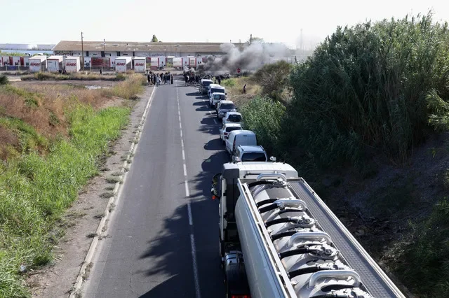 French fishermen burn tyres and wooden pallets to block access to the Frontignan oil depot to protest against fuel prices and deteriorating working conditions, in Frontignan near Sete, southern France, September 17, 2026. REUTERS/Alexandre Dimou