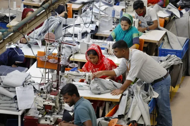 Bangladeshi garment workers make clothing in the sewing section of a factory in Gazipur, Bangladesh, April 9, 2025. REUTERS/Mohammad Ponir Hossain