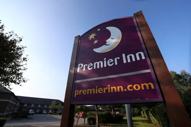 A signage of the Premier Inn Hotel is seen outside the Durham North branch after the chain announced job cuts nationwide, in County Durham, Britain September 22, 2020. REUTERS/Lee Smith/File Photo