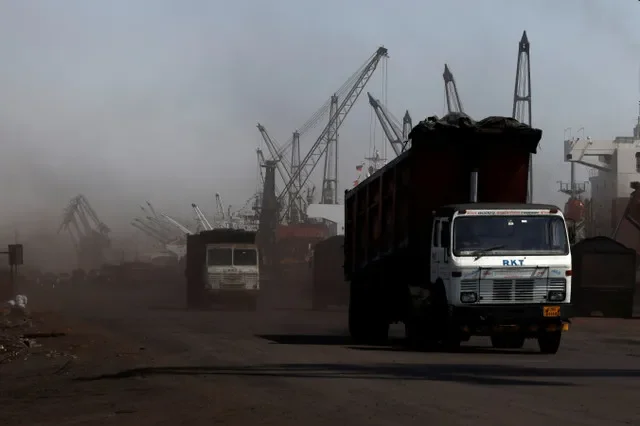 Trucks loaded with coal drive to the coal yard at the Deendayal Port in Kandla, in the western state of Gujarat, India, April 5, 2025. REUTERS/Amit Dave