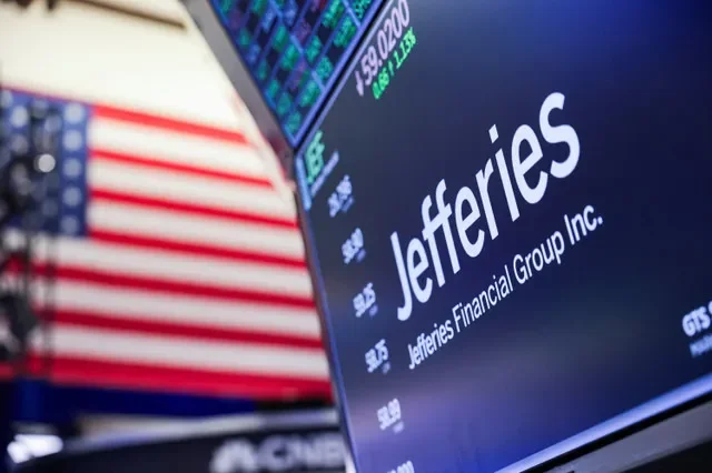 The company logo for Jefferies Financial Group Inc. is displayed on a screen on the floor of the New York Stock Exchange (NYSE) in New York, U.S., July 30, 2025.
