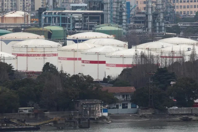Oil storage tanks and facilities of a Sinopec plant in Shanghai, China, March 26, 2026. REUTERS/Go Nakamura/File Photo
