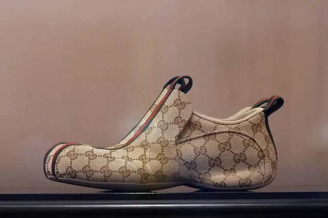 A Drip sneaker model by Gucci is displayed in a Gucci store in Paris, France, September 23, 2026. REUTERS/Abdul Saboor