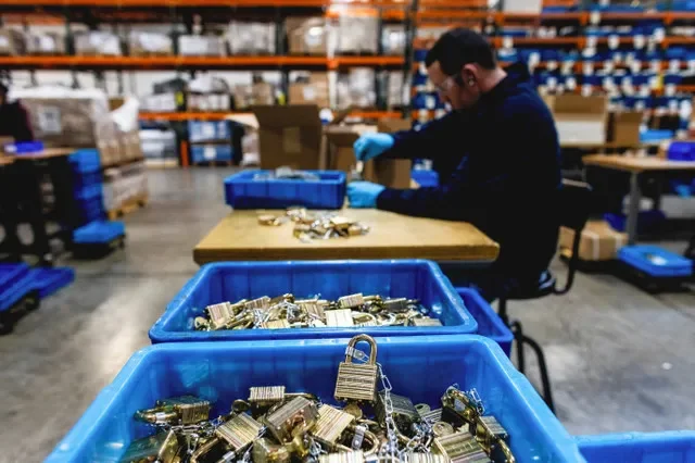 FILE PHOTO: A worker makes locks at the Pacific Lock factory in Valencia, California, U.S. December 23, 2025. REUTERS/Aude Guerrucci/File Photo