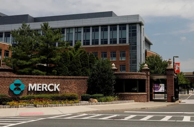 FILE PHOTO: The Merck logo is seen at a gate to the Merck & Co campus in Rahway, New Jersey, U.S., July 12, 2018. REUTERS/Brendan McDermid/File Photo