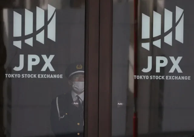 Signage of Japan Exchange Group (JPX) at Tokyo Stock Exchange in Tokyo, Japan, April 6, 2026. REUTERS/Issei Kato
