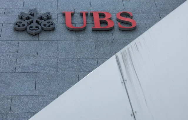 FILE PHOTO: A UBS logo is pictured on the branch of the Swiss bank in Lucerne, Switzerland, June 14, 2024. REUTERS/Denis Balibouse/File Photo