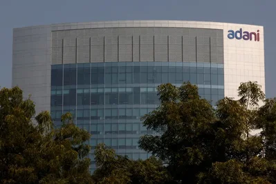 India Regulator Clears Adani to Settle Float Case