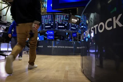 US futures rise as tech steadies