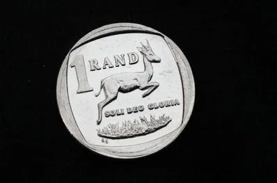 South African rand holds steady on mixed data