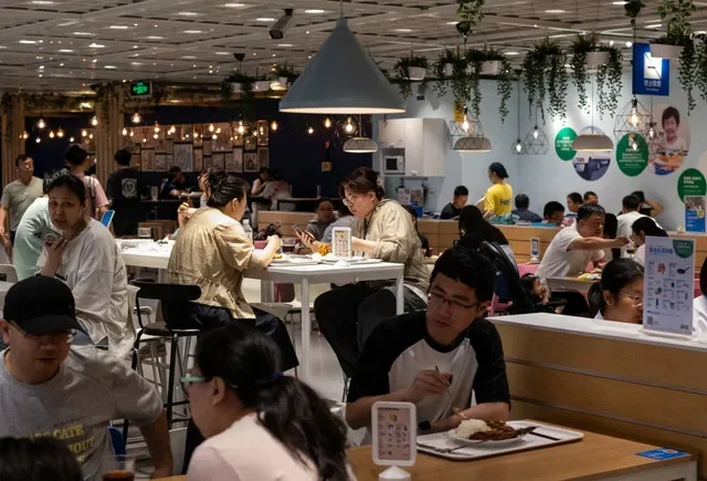 People have their meals at a restaurant inside an IKEA store in Beijing, China, July 5, 2026. REUTERS/Maxim Shemetov/File Photo