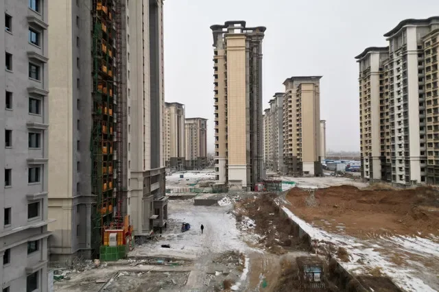 An aerial view of unfinished residential compound developed by China Evergrande Group, in the outskirts of Shijiazhuang, Hebei province, China February 1, 2024. REUTERS/Tingshu Wang
