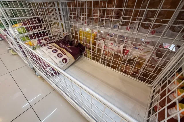 A 5-kilogram sack of premium rice, which according to the shopkeeper has become scarce in recent weeks, is displayed for sale at a supermarket in Jakarta, Indonesia, October 1, 2026. Picture taken with a mobile phone. REUTERS/Willy Kurniawan