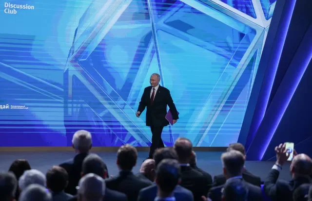 Russian President Vladimir Putin walks to attend a plenary session of the Valdai Discussion Club in Moscow, Russia, October 1, 2026. REUTERS/Ramil Sitdikov