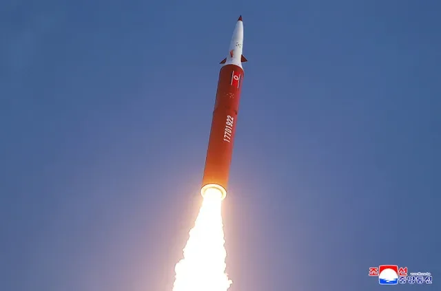 An intermediate-range missile is fired during a drill overseen by North Korean leader Kim Jong Un from the eastern region of the country toward the East Sea in North Korea, October 3, 2026, in this picture released by North Korea's official Korean Central News Agency. KCNA via REUTERS