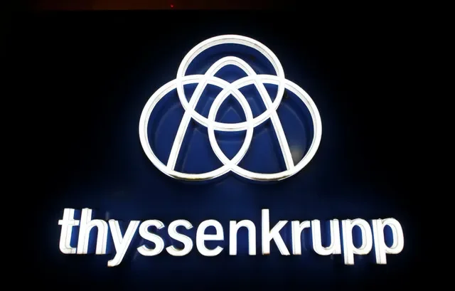 FILE PHOTO: Thyssenkrupp's logo is seen outside the elevator test tower in Rottweil, Germany, January 21, 2020. REUTERS/Michaela Rehle/File Photo