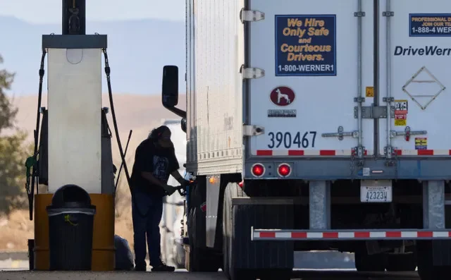 A driver fills his semi with diesel at a truck stop in Dunnigan, California, U.S., September 28, 2026. REUTERS/Fred Greaves