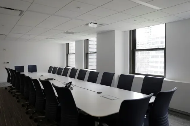 FILE PHOTO: A boardroom is seen in an office building in Manhattan, New York City, New York, in this illustration, U.S., May 24, 2021. REUTERS/Andrew Kelly/File photo