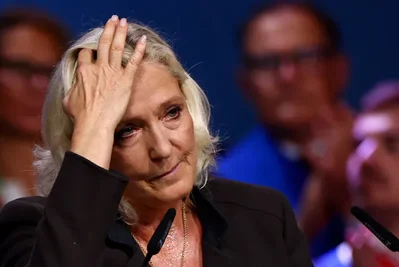 Le Pen pitches deep budget cuts as French bonds fall