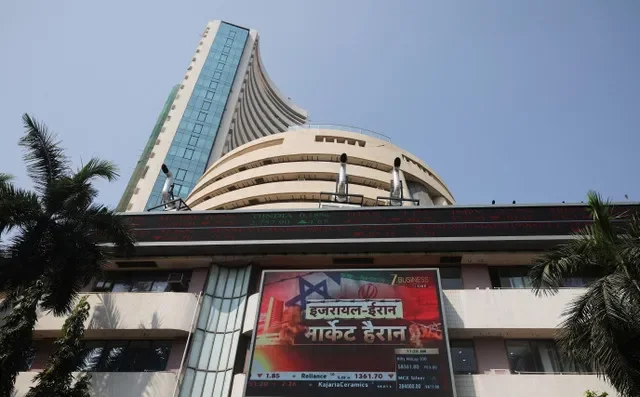 The Israeli and Iranian flags are displayed on a screen at the Bombay Stock Exchange (BSE) in Mumbai, India, March 2, 2026. REUTERS/Francis Mascarenhas