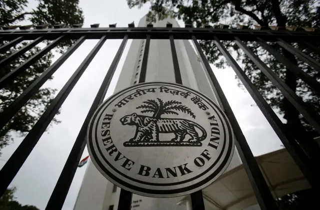 FILE PHOTO: The Reserve Bank of Indian seal is pictured on a gate outside the RBI headquarters in Mumbai. REUTERS/Vivek Prakash