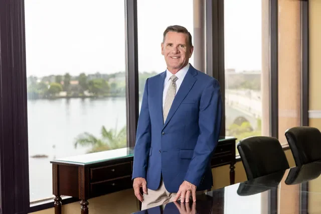 Bill Perry, managing partner of the Gunster law firm, in his Phillips Point office overlooking the Intracoastal Waterway in West Palm Beach.