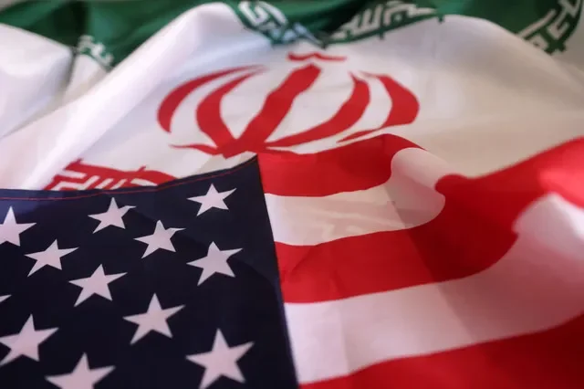 USA and Iranian flags are seen in this illustration taken, September 8, 2022. REUTERS/Dado Ruvic/Illustration