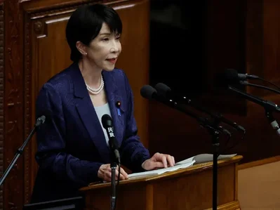 日本首相誓言密切關注日圓