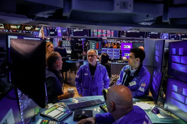 FILE PHOTO: Traders work on the floor at the New York Stock Exchange (NYSE) in New York City, U.S., September 15, 2026. REUTERS/Jeenah Moon/ File Photo