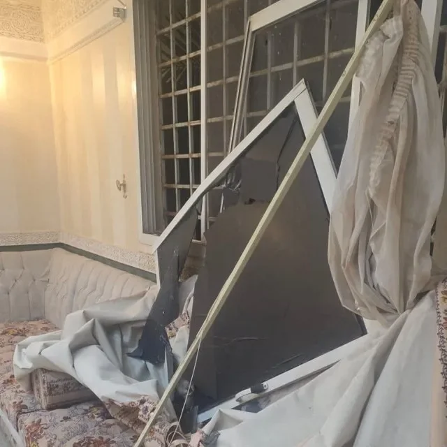Damage inside a residential building, which according to authorities was one of the 15 residential homes that suffered damages on October 13 from the fall of shrapnel resulting from the interception of two cruise missiles, in Riyadh, Saudi Arabia, in this handout image released on October 14, 2026. Saudi Press Agency/Handout via REUTERS