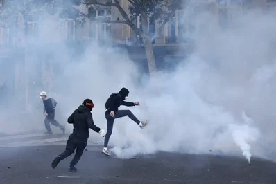 French police clash with protesters over living costs