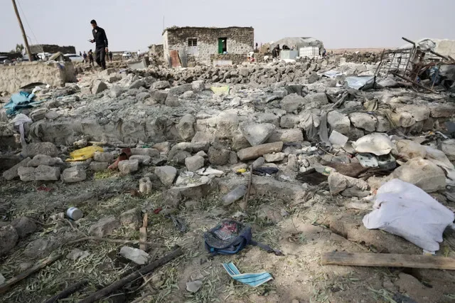 A man inspects the site of a reported Jordanian airstrike where four members of the same family, including three children, were killed, in the town of Al-Mismiyah, in Syria's southern Daraa province, October 27, 2026. REUTERS/Khalil Ashawi
