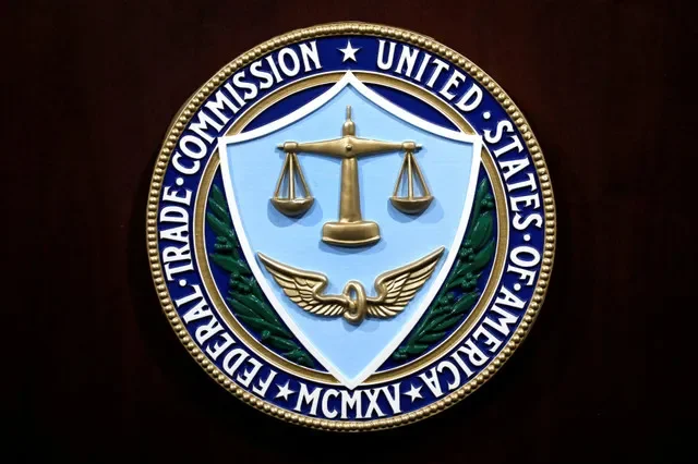FILE PHOTO: Federal Trade Commission seal is seen at FTC Headquarters in Washington, U.S., July 24, 2019. REUTERS/Yuri Gripas/File Photo